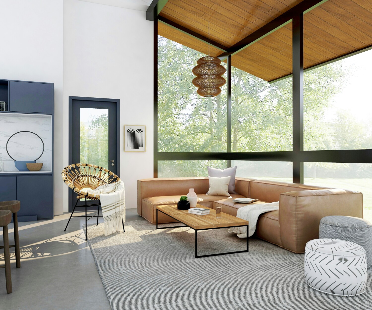 Open plan living room kitchen layout with tan sofa and rug